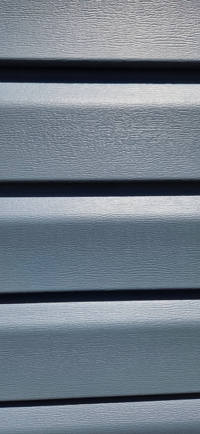 Clean siding detail after soft washing
