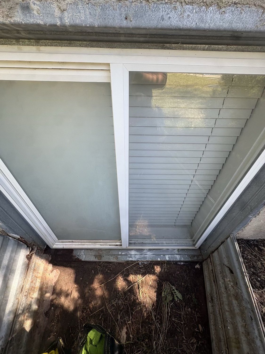 Clean residential window and frame after cleaning by Dirt Gone Wash Co in Salt Lake City